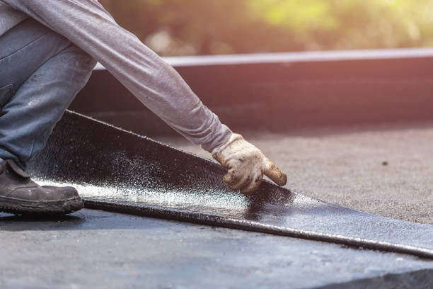 Professional Waterproofing technician working in Magnolia Springs, AL